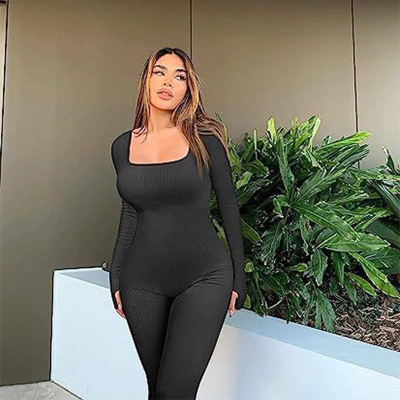 Woman wearing seamless long-sleeve yoga jumpsuit in active pose